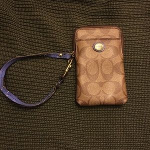 Coach wristlet. Purple and traditional logo!